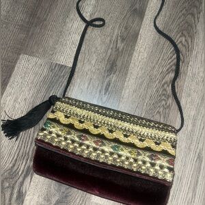 La Regale Black and Gold Crossbody Bag